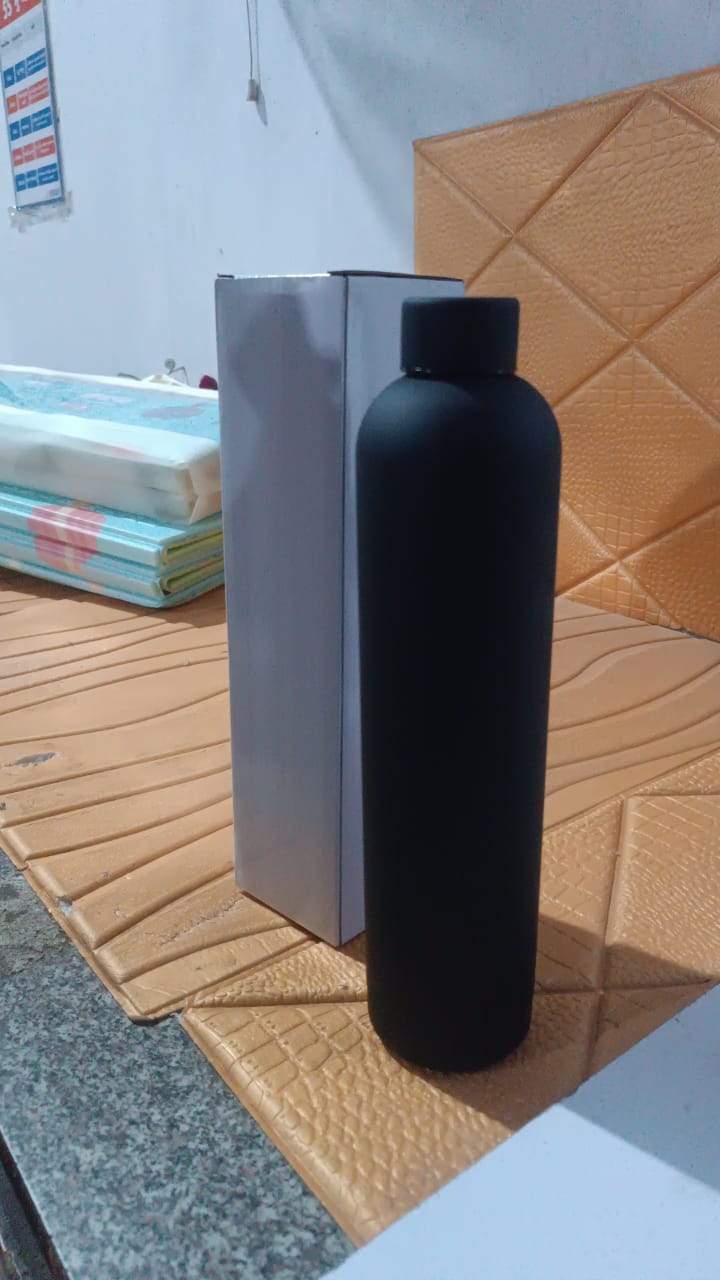 Stainless Steel Double Wall Vacuum-Insulated Drink Water Bottle (1000 ML Approx) Stainless Steel Double Wall Vacuum-Insulated Drink Water Bottle (1000 ML Approx)
